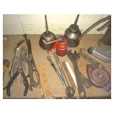 small vintage oil cans and tools