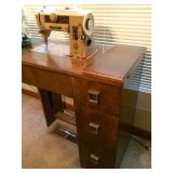 Vintage Singer 401A industrial machine in cabinet