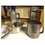 Vintagel metal ricer and flour sifter