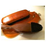 Vintage wooden-handled comb-and-brush set, with wall hanger