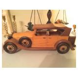 Oversized wooden carved jalopy