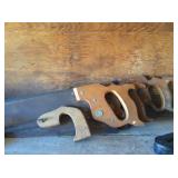 Antique wood-handled saws