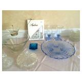 Blue glass sandwich tray and blue glass candle are sold