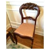 Set of six carved dining chairs