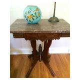 Carved side table with kidney marble and Italian painted vase