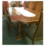 Dining-room table with six cane-back chairs