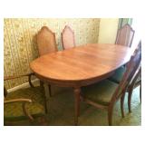 Oval dining table with leaf and six chairs
