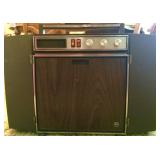 Vintage portable drop-down turntable with detachable speakers