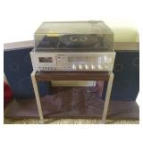 Vintage working stereo system on rolling cart
