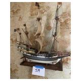 Wooden Model Ship on Shelf