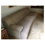 Mid Century Sofa, Long and Slightly Curved, Looks Barely Used. Lot Number: 6