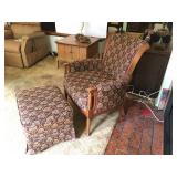 Upholstered Chair with Wood Trim and Matching Ottoman. Ottoman has casters. In Good Condition. Lot N