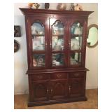 Cherry Wood China Hutch with Brass Fixtures , Inside Light, Mirrored Back, Glass Shelves. Lot Number