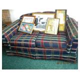 plaid couch/framed photos 