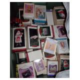 Lots of Hallmark orniments in boxes