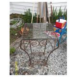 glass top wrought iron table