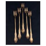 5 Wm Rogers seafood forks