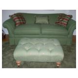 Green love seat and ottoman