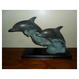 Brass dolphins