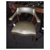 Matching green leather chairs