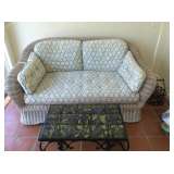 wicker sofa with cushions