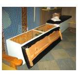 Long storage units w/padded seat tops