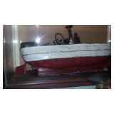 Antique metal pond boat with steam enging