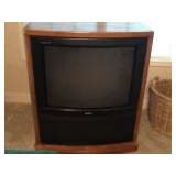 Sony TV in oak cabinet