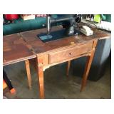 Singer Sewing Machine in cabinet