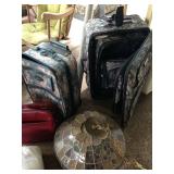 Luggage and Stain Glass Lamp