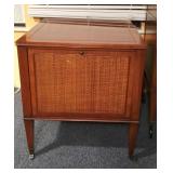 VINTAGE MID CENTURY RECORD CABINET ON CASTERS.  