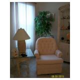 Occasional swivel chair and rattan and glass end table