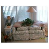 Loveseat , small side table , floor lamp