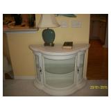 Light wood bowfront curio cabinet