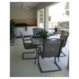 Patio table with 4 of 6 chairs