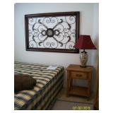 night stand and wall art