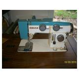 White sewing machine in table