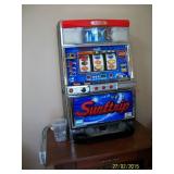 Surftrip slot machine uses tokens