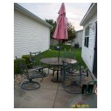 patio table with 4 chairs , umrella and stand. sorry no cushions.