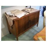 Motorola TV cabinet; delivered 4/21/67 has label on back. They have repurposed it into a sideboard.