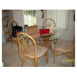 Rattan and glass table with 4 chairs