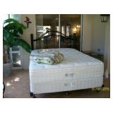 Queen bed with metal headboard