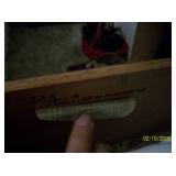 Brand on inside of dresser