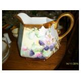 Hand painted and signed china pitcher