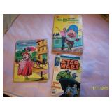 Several vintage coloring books and 1 Star Wars comic book