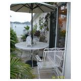 Patio table with 4 chairs and umbrella