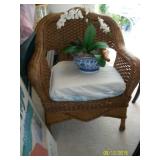 1 of 2 brown wicker chairs