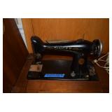 Vintage Singer Sewing table with attachments 