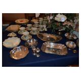Silver plates, floral centerpiece
