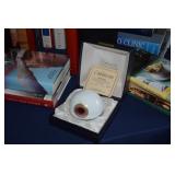 Caithness glass paperweight, books